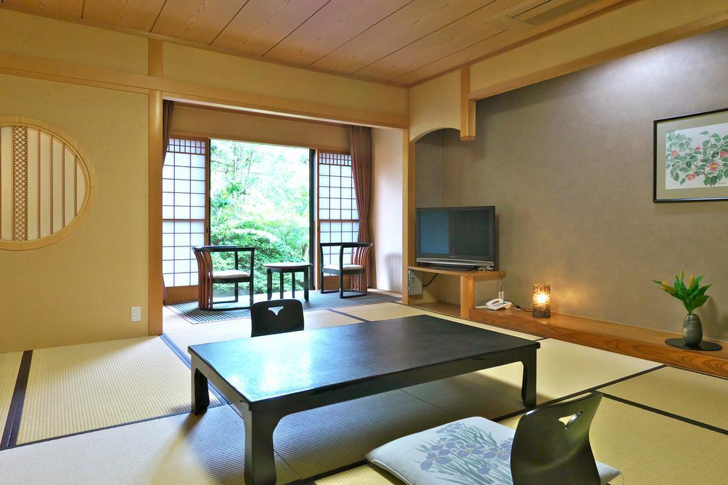 Yuraku Hotel Awara Zimmer foto