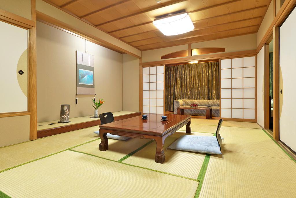 Yuraku Hotel Awara Zimmer foto
